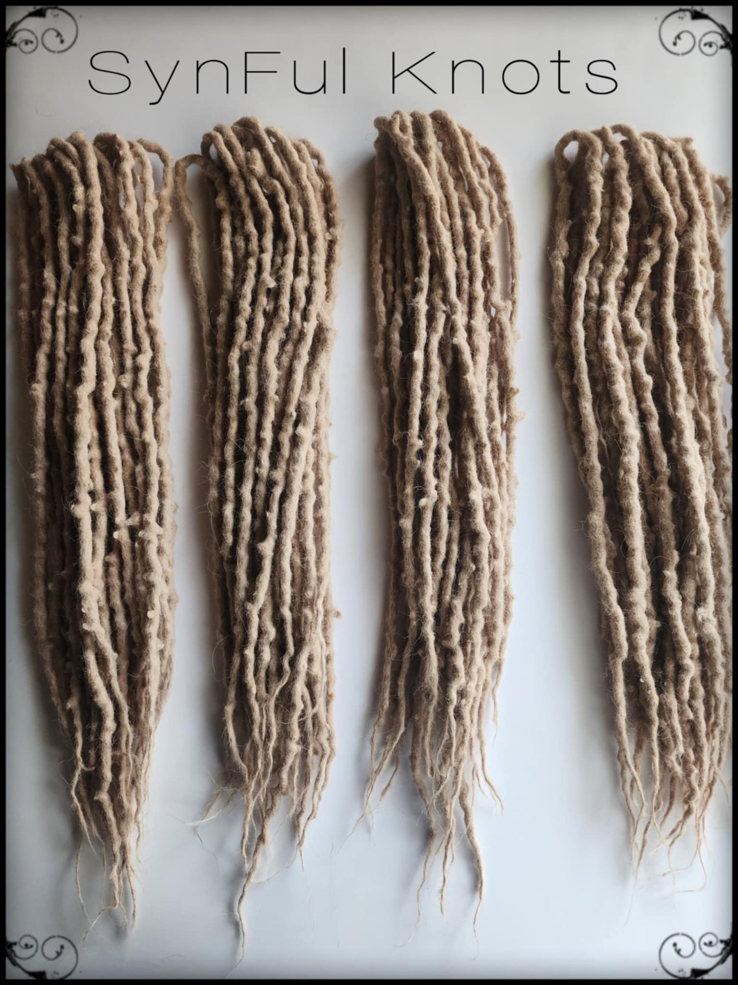 Light brown alpaca wool dreadlocks, made by Synful Knots.